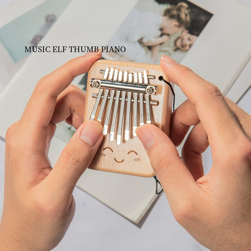 Solid Wood 9-tone Mini Thumb P - огляд і ціна Musical Instrument Kalimba
